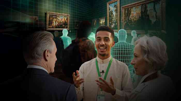 Guide in museum explaining a concept to an older couple