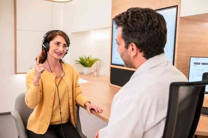 Woman taking a hearing test
