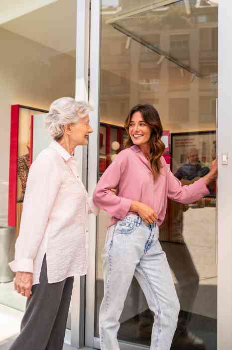 a couple meeting an audiologist in a national hearing care center 