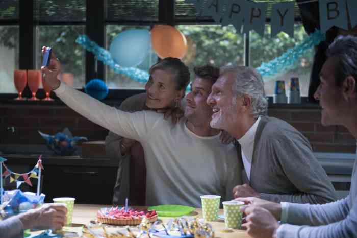 A family taking a selfie photo