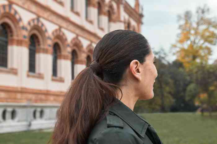 woman in park with hearing aid
