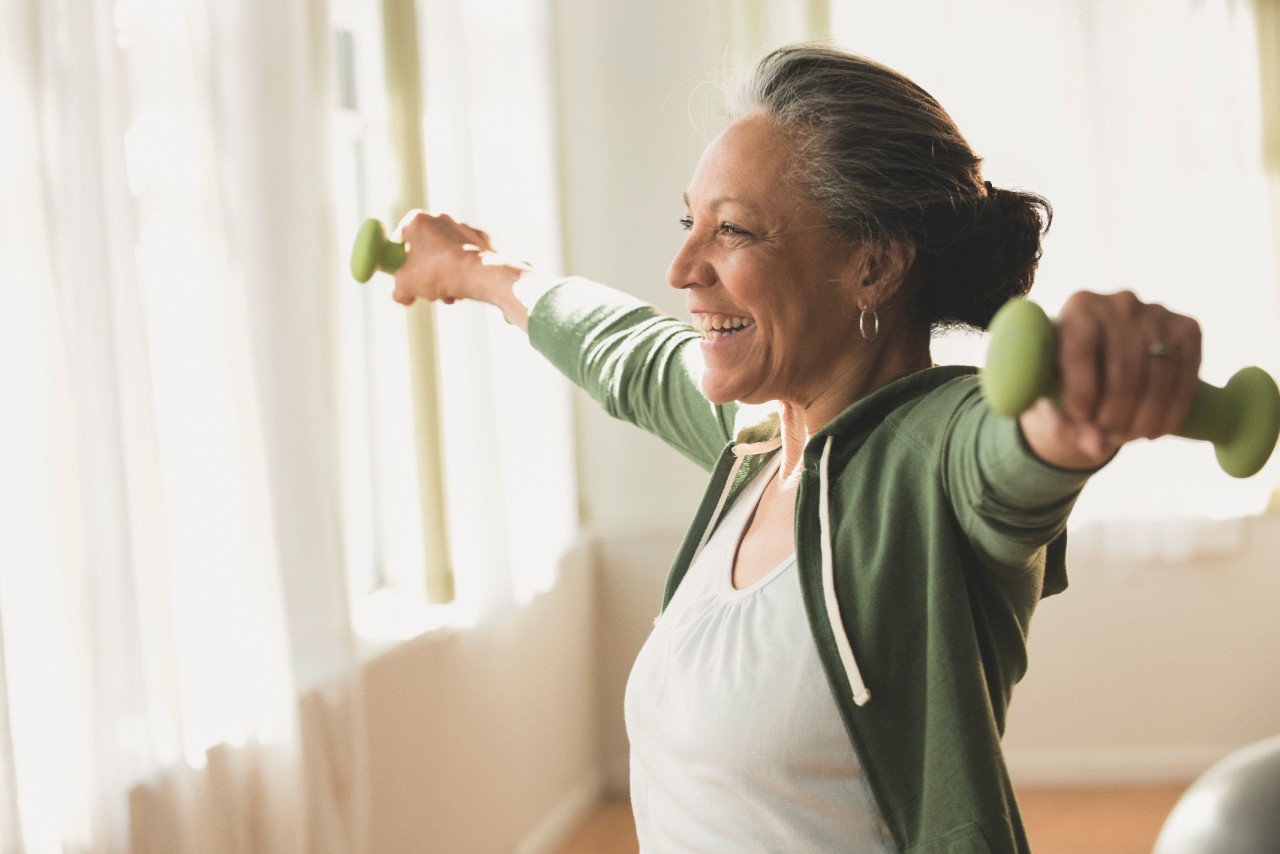 woman exercising with weights