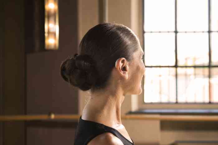 a woman wearing hearing aids and dancing tango