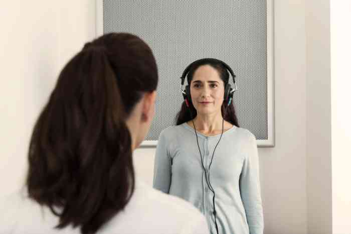 woman taking a hearing test