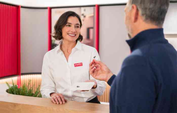 two women and a man in a national hearing care center 