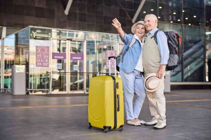 couple on holiday leaving the airport