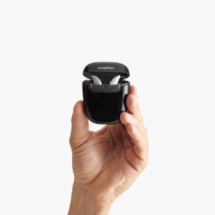 ampli-energy R 5 - Rechargeable Hearing Aid hold in a hand: dimensions