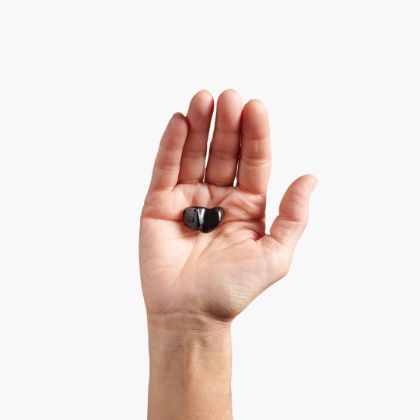 ampli-energy IN Sync - Rechargeable Hearing Aid hold in a hand: dimensions
