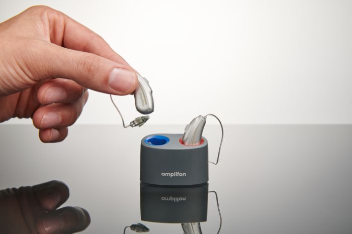 ampli-connect rechargeable hearing aids in their charger