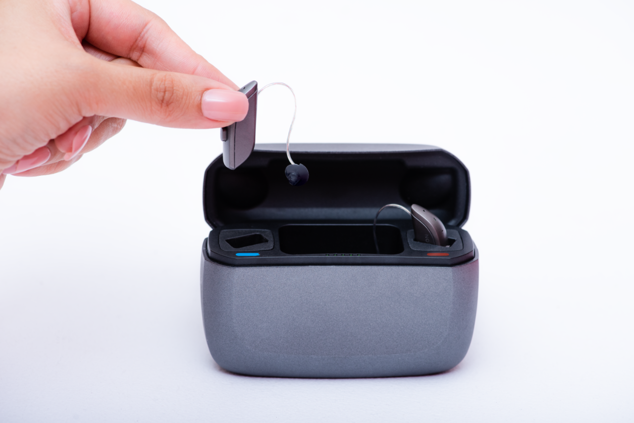 Amplifon hearing aids on hand
